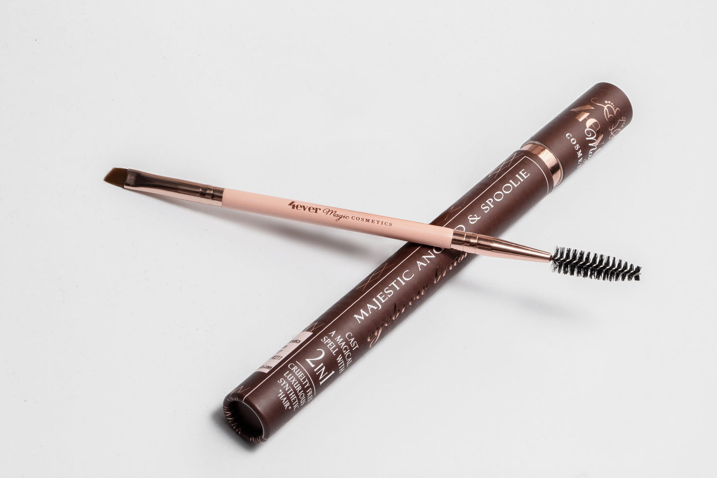 It’s a magic wand: a 2-in-1 Brush that is both a majestic angled and a spoolie brush in one for blending and combing your eyebrows.